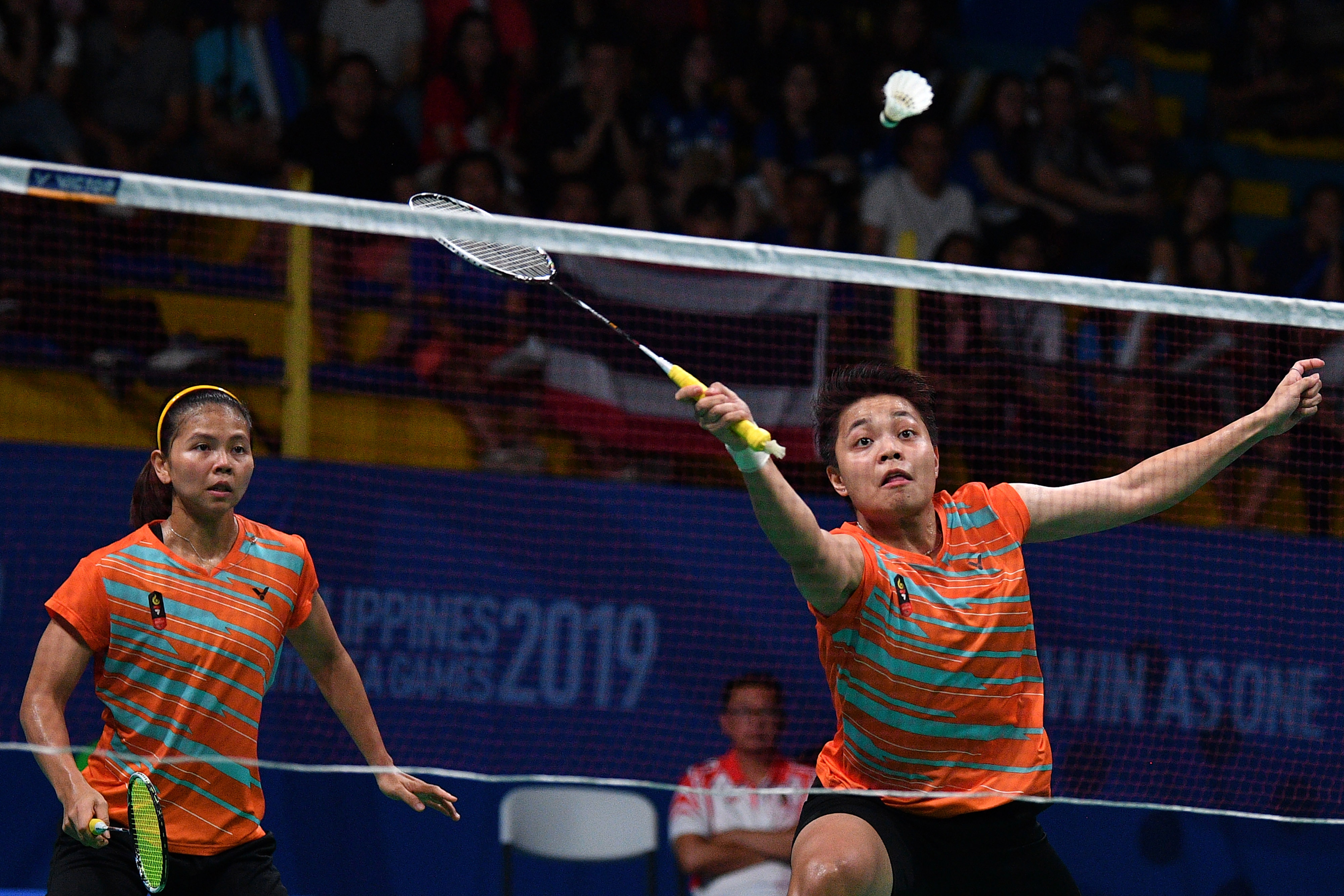  Ganda putri Indonesia Apriyani Rahayu (kanan) dan Greysia Polii saat menghadapi pasangan Thailand  di SEA Games Filipina 2019 lalu.