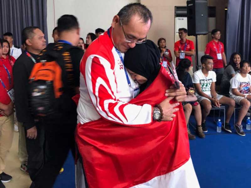 Suci Wulandari meraih medali emas pencak silat SEA Games 2019 di Filipina.