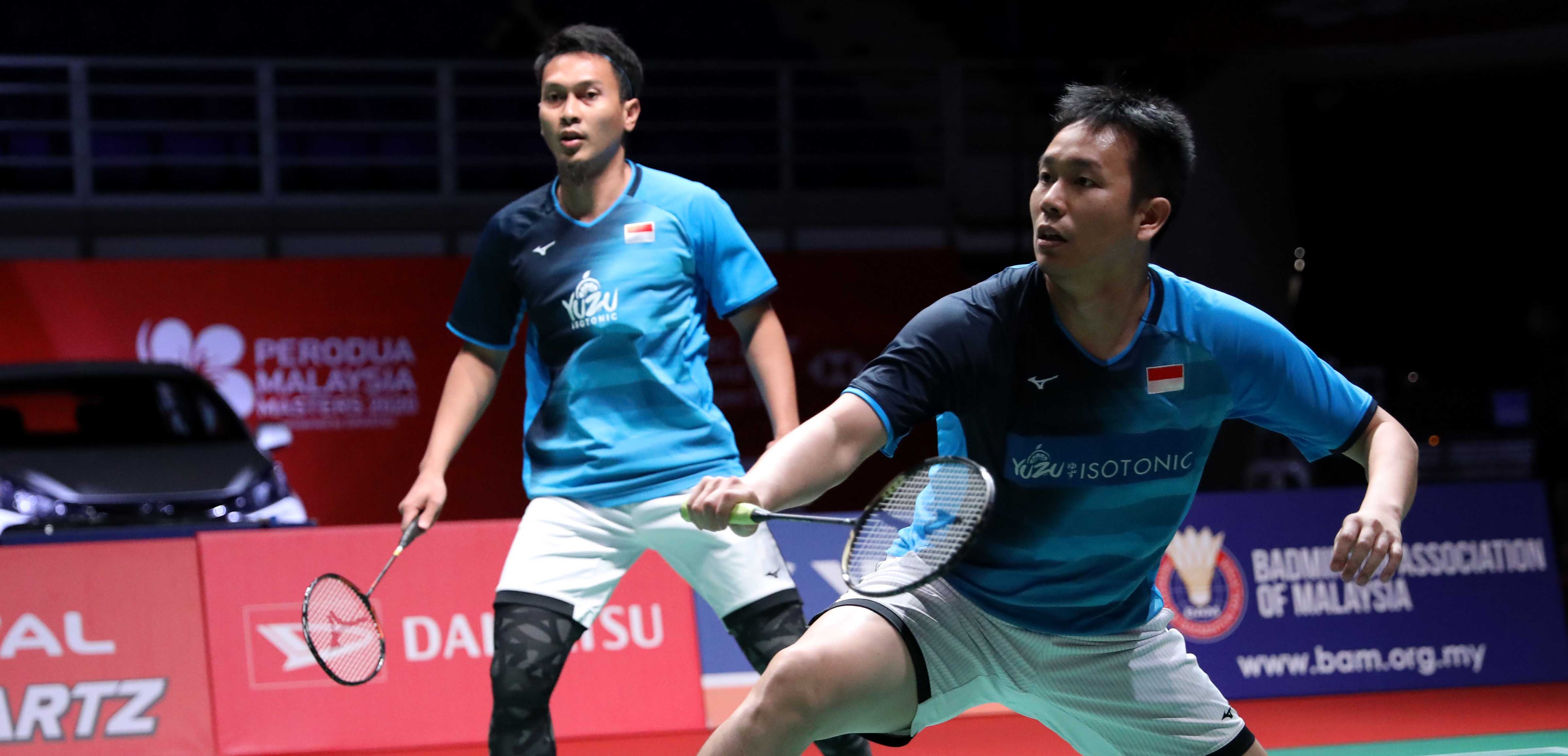 Mohammad Ahsan (kiri) dan Hendra Setiawan suskes melangkah ke babak semifinal Malaysia Masters 2020.