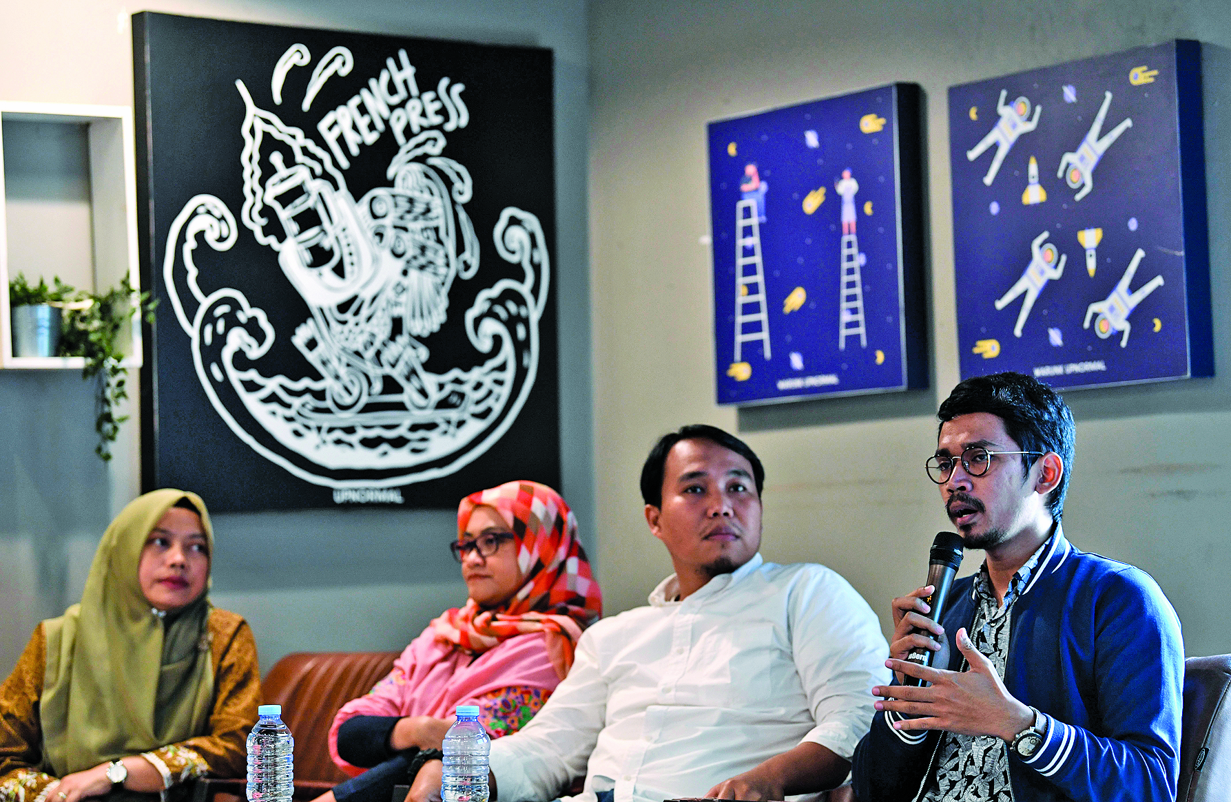 Executive Director Perludem Titi Anggraini (kiri), Deputy Director Khoirunnsa Agustyati (kedua kiri), Program Officer Heroik Pratama (kanan)