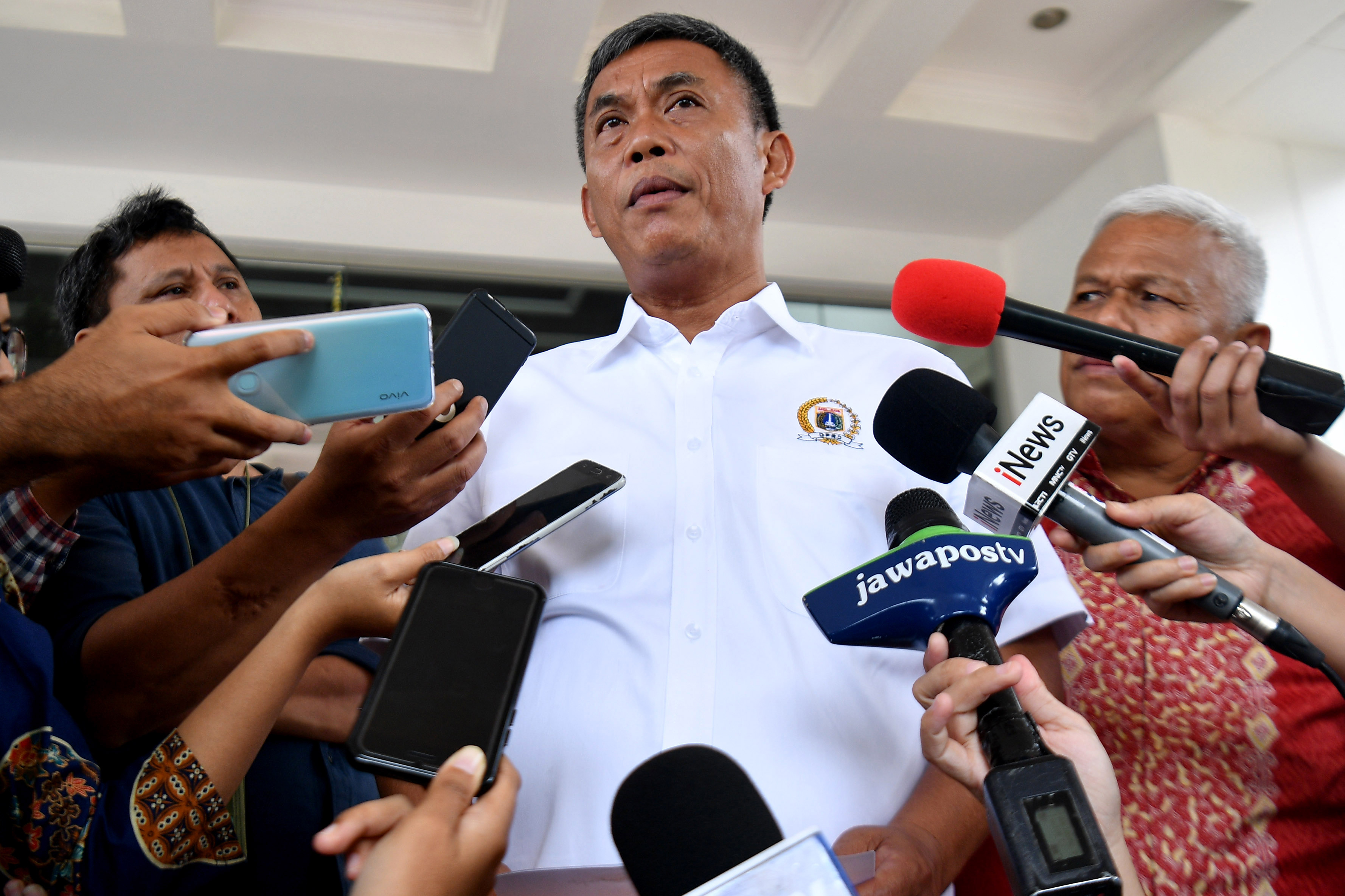 Ketua DPRD DKI Jakarta Prasetyo Edi Marsudi menjawab pertanyaan wartawan di Kementerian Sekretariat Negara, Jakarta, Kamis (13/2/2020).