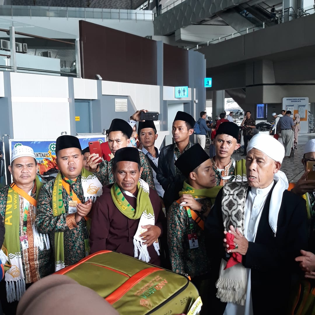 Suasana kepulangan jemaah umrah asal Indonesia di Dubai, Sabtu (29/2/2020).