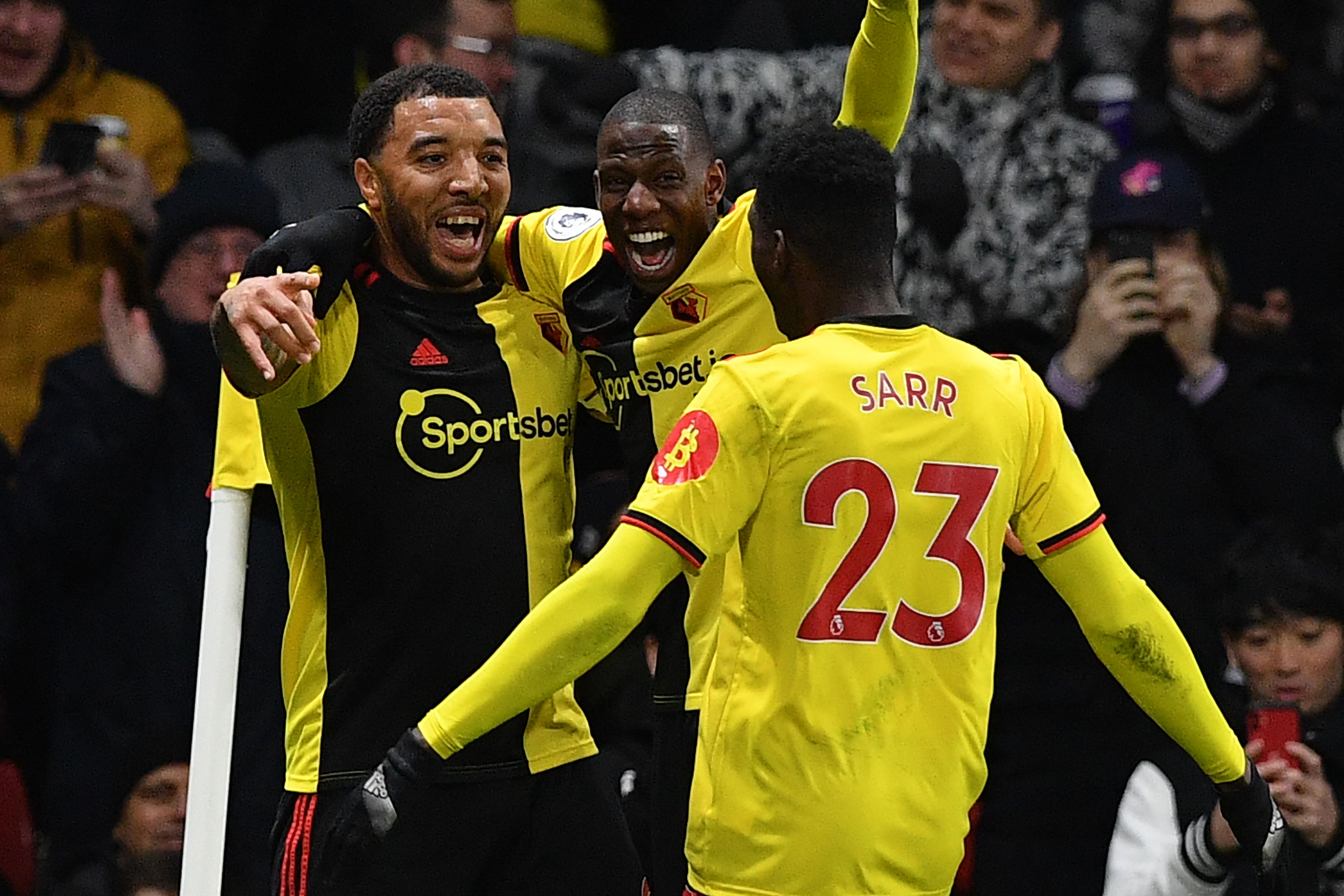 Troy Deeney (kiri), Ismail Saar dan Abdoulaye Doucoure (tengah) kunci kemenangan Watford melawan Liverpool 3-0.