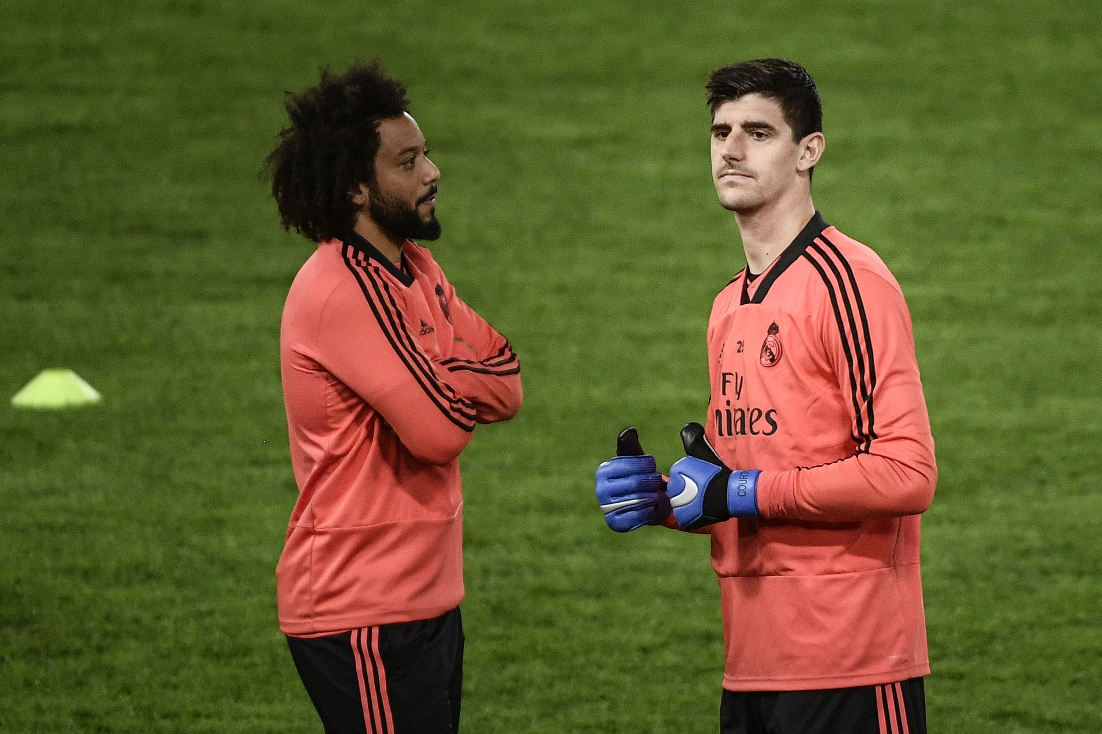 Duet pemain Real Madrid Marcelo (kiri) dan Thibaut Courtois