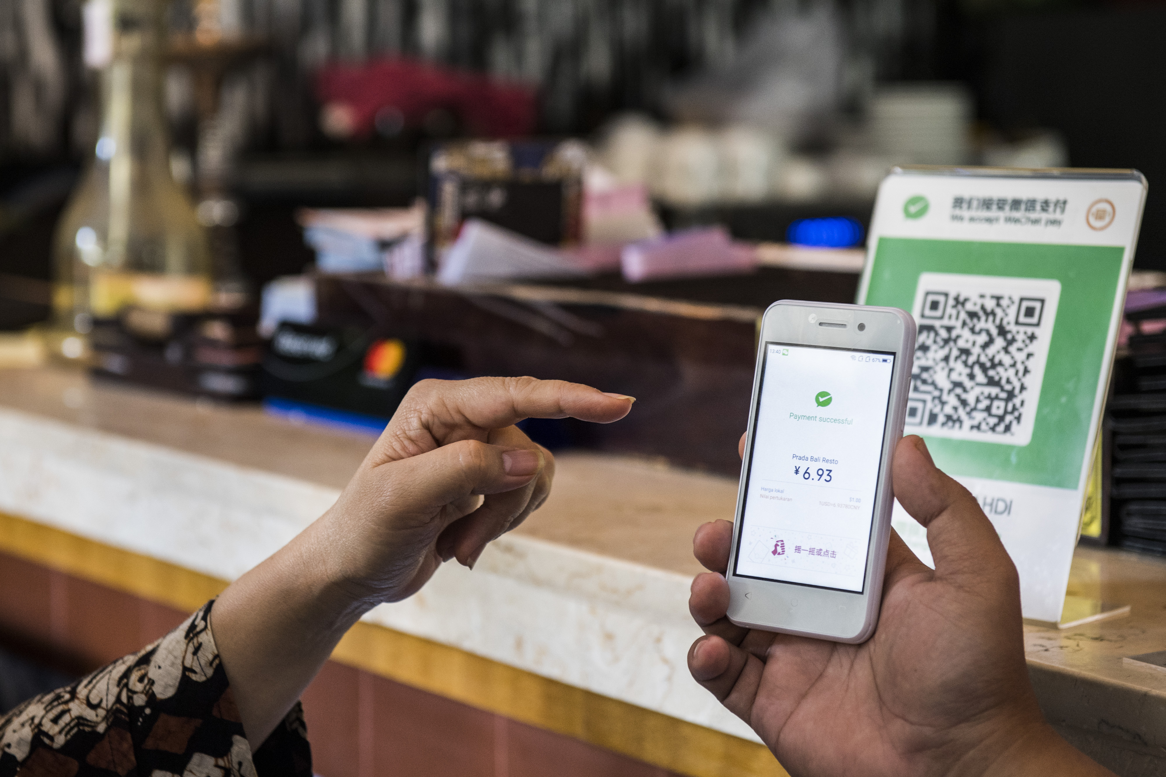 Penggunaan QRIS sebagai pembayaran tunai tengah digalakkan.