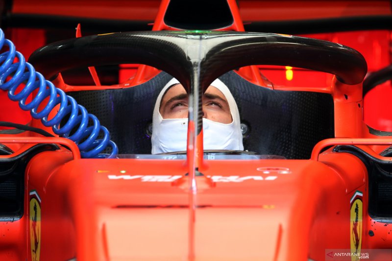 Pebalap tim Ferrari di sesi latihan Grand Prix Jerman, Hockenheimring (26/7)
