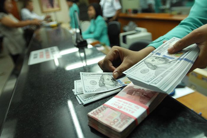 Ilustrasi usaha money changer turut terkena imbas pandemi Covid-19.  