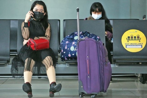 Pekerja migran Indonesia yang tiba dari Taiwan di Terminal 3 Bandara Internasional Soekarno-Hatta, Cengkareng, Tangerang, kemarin