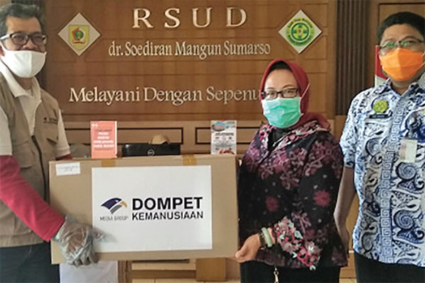 Penyaluran donasi Dompet Kemanusiaan Media Group (DMKG)