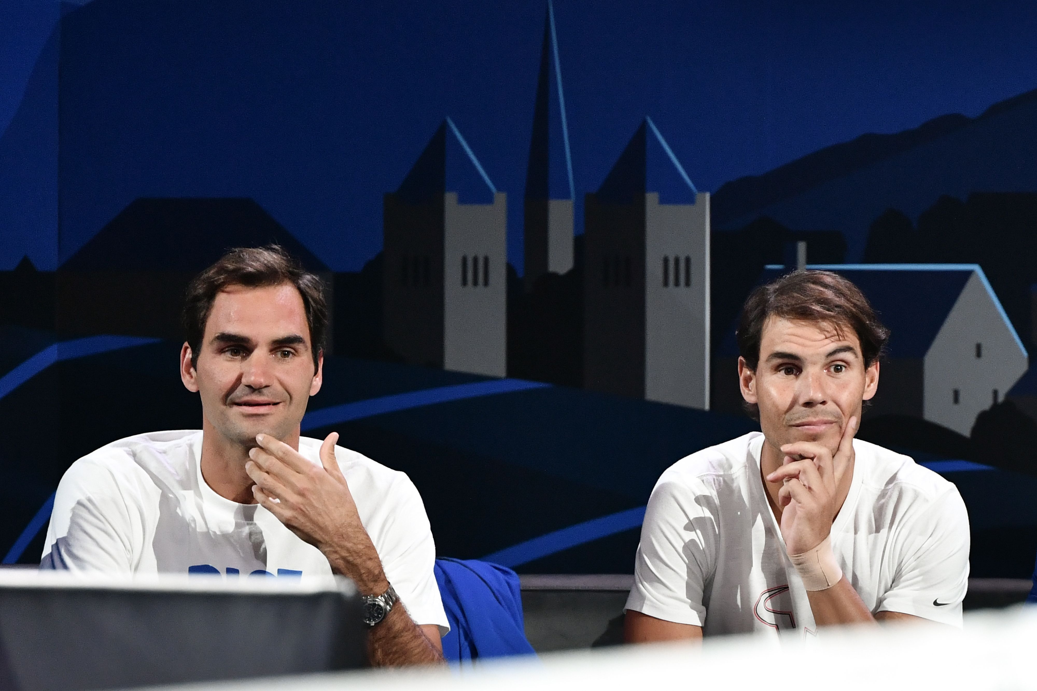Roger Federer (kiri) dan Rafael Nadal