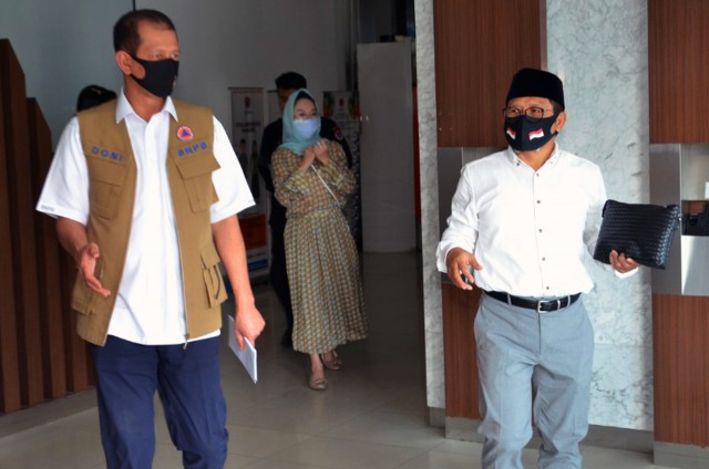 Wakil Ketua DPR RI Muhaimin Iskandar (Kanan) usai berdiskusi dengan Kepala BNPB Doni Monardo.