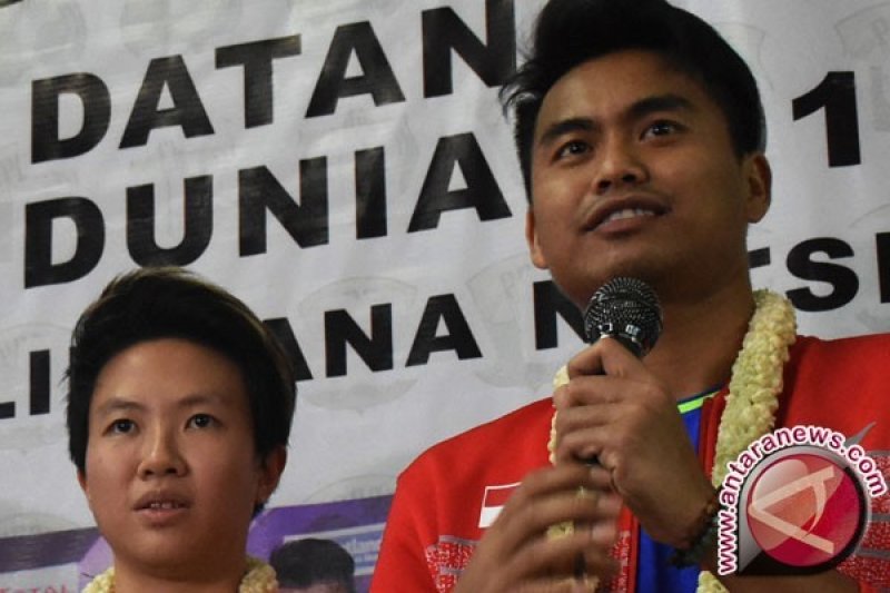Dok - Tontowi Ahmad (kanan) dan Liliyana Natsir (kiri).