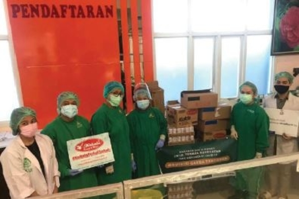 Kokola Group Donasikan Ribuan Biskuit 