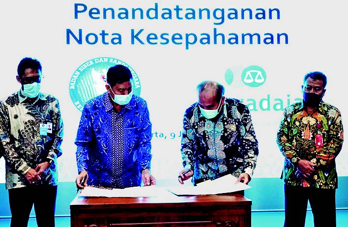 Pegadaian bersama BSSN menandatangani kerja sama sistem keamanan informasi dan data elektronik di Jakarta, kemarin.