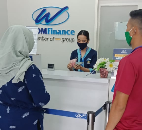 Ilustrasi layanan WOM Finance d tengah pandemi Covid-19