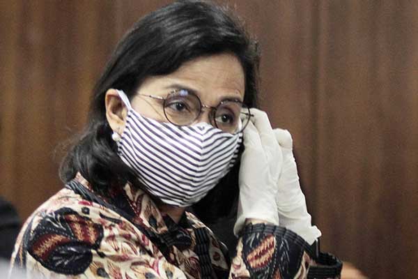 Sri Mul­yani, Menteri Keuangan.