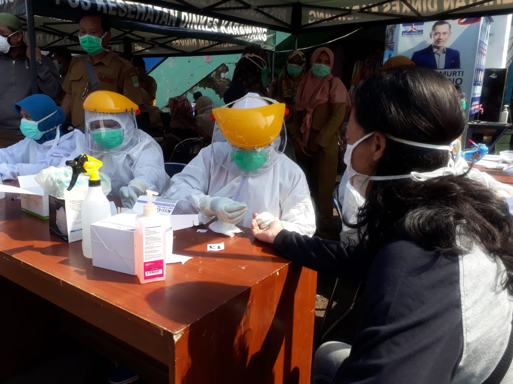 Rapid test dan swab tes dilaksanakan secara acak dan massal di 14 pasar tradisional di Kabupaten Sleman