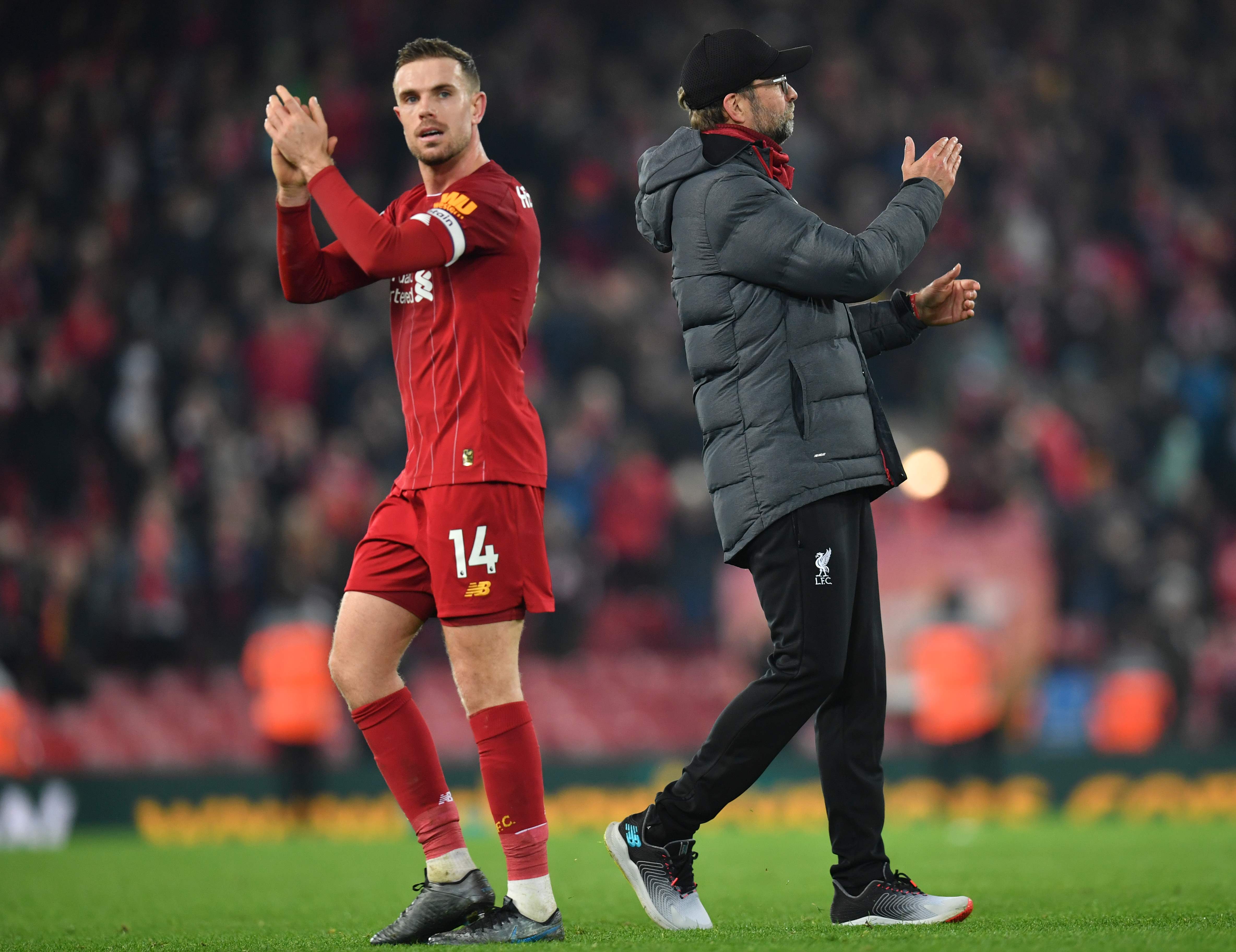Jordan Henderson (kiri) dan Juergen Klopp (kanan)
