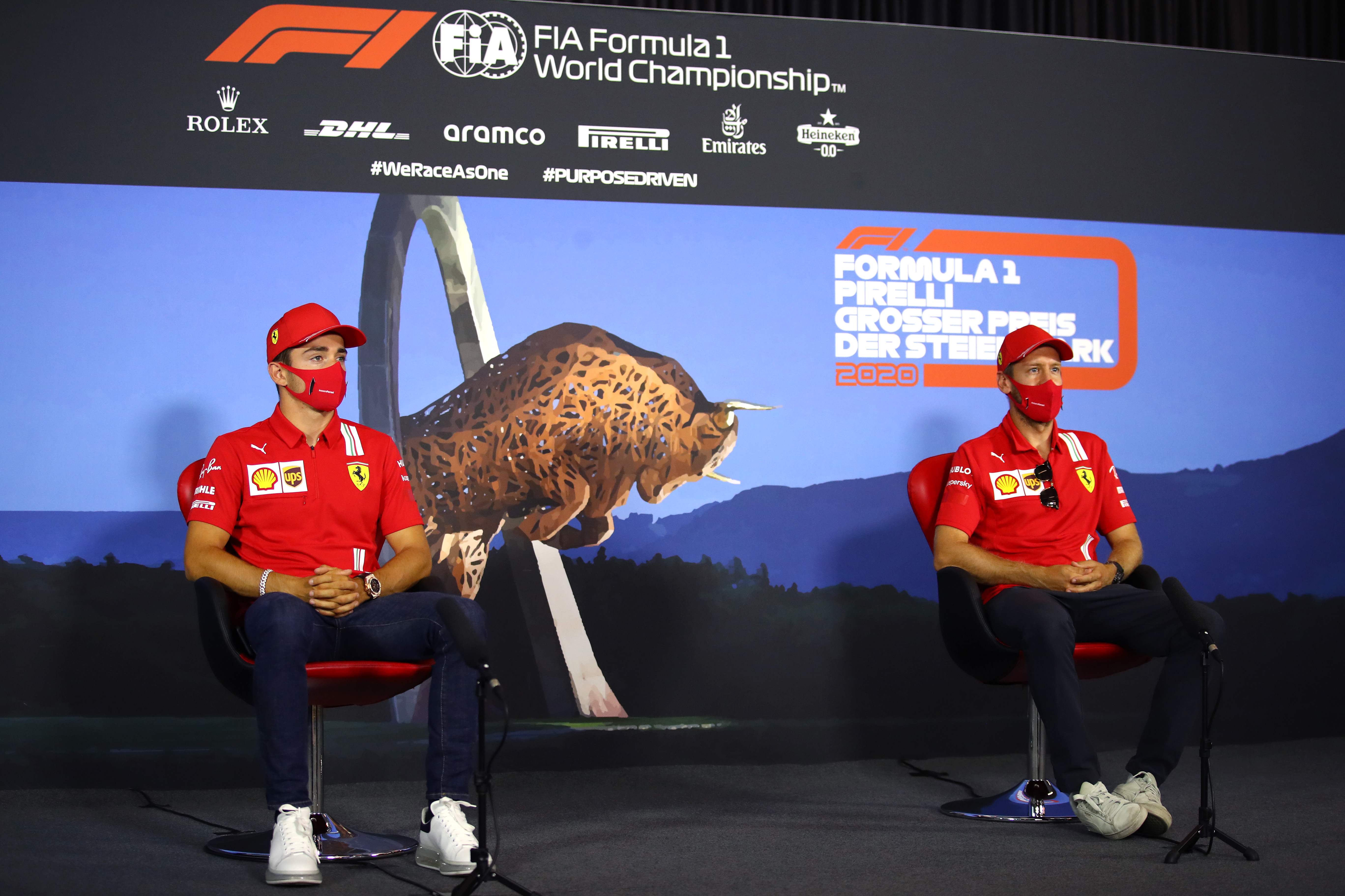 Pembalap Ferrari Charles Leclerc (kiri) and Sebastian Vettel 