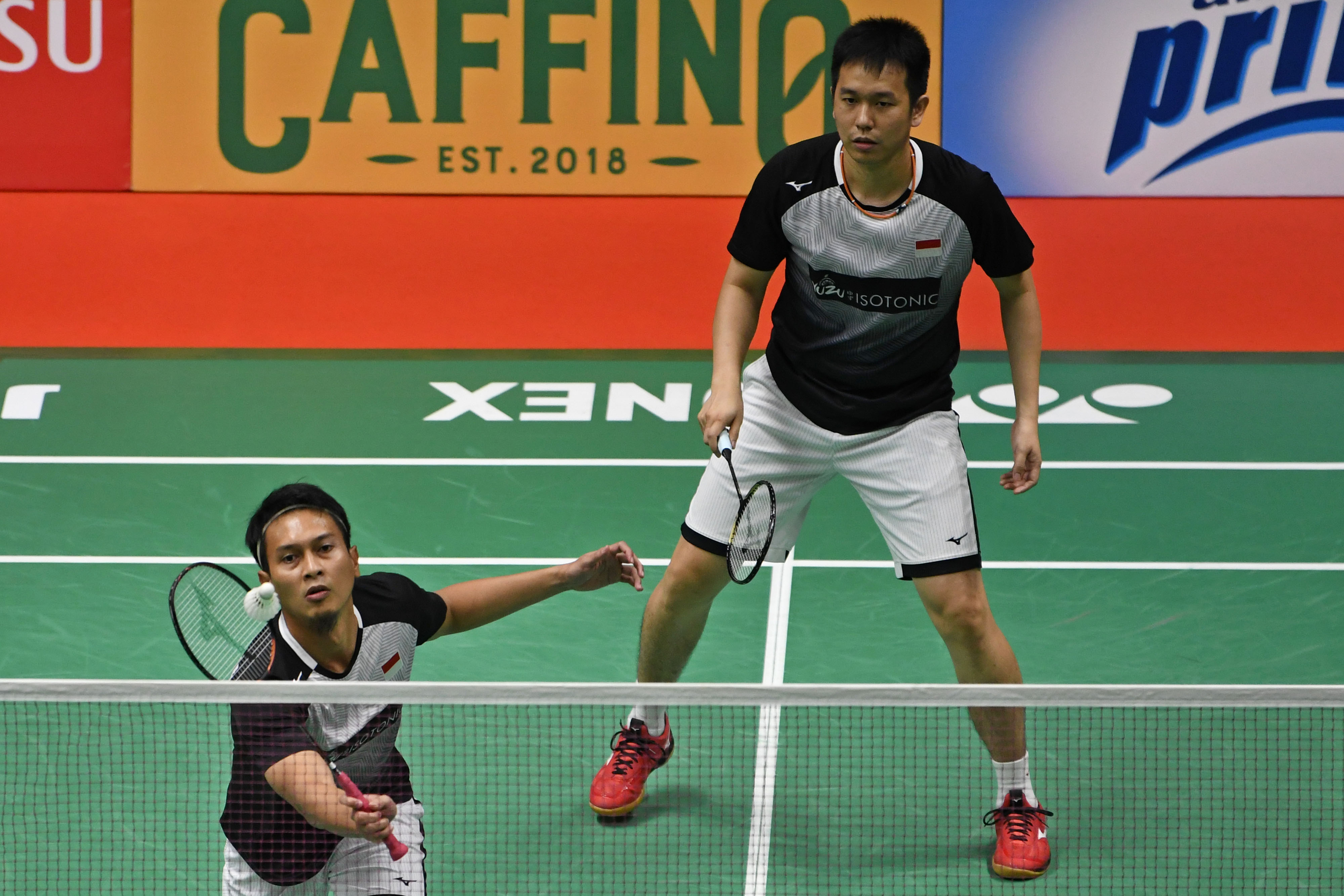Pebulu tangkis ganda putra Mohammad Ahsan/Hendra Setiawan saat berkompetisi di Istora Senayan, Jakarta.