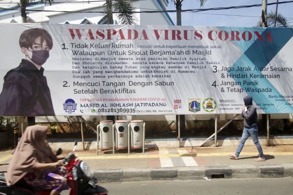 Spanduk Waspada Covid-19