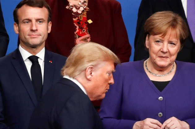Presiden Perancis Emmanuel Macron (kiri), Presiden AS Donald Trump (tengah) dan Kanselir Jerman Angela Merkel (kanan)