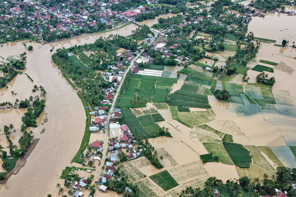 BANJIR DI NAGARI TARAM: Foto udara banjir merendam Nagari Taram, Kecamatan Harau, Kabupaten Limapuluh Kota, Sumatra Barat, Sabtu (5/9). 