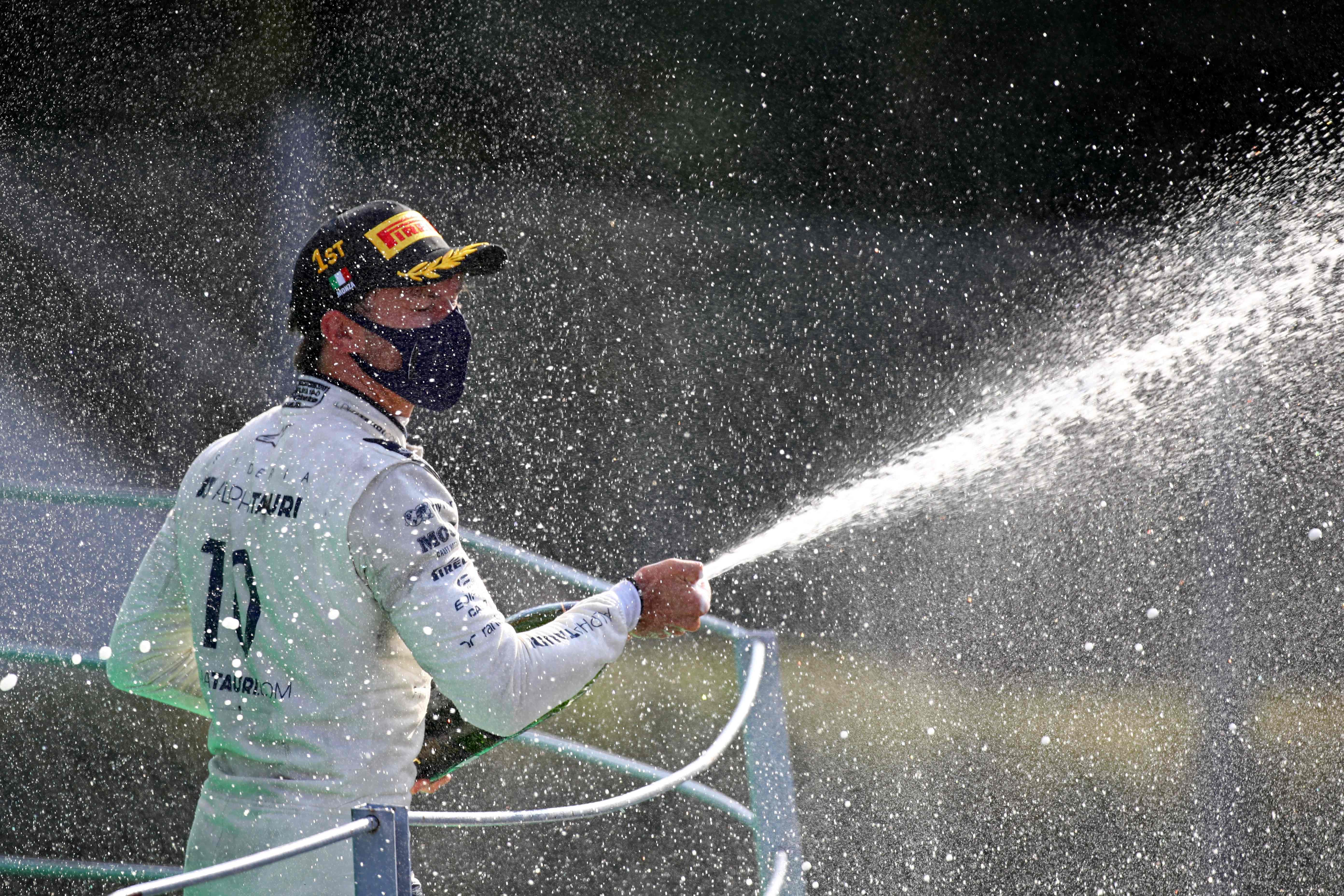 Pembalap AlphaTauri, Pierre Gasly merayakan kemenangannya di GP Italia