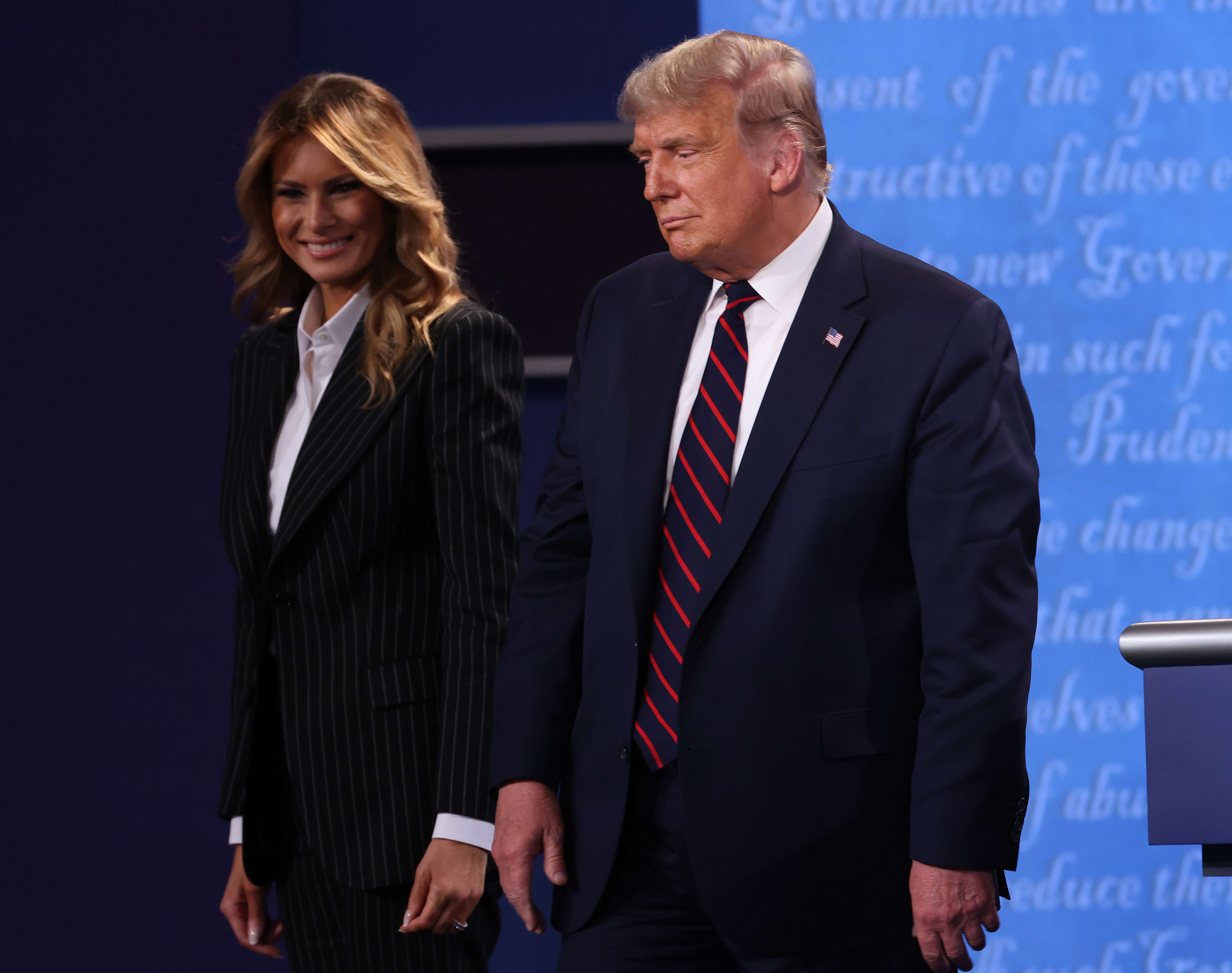 Presiden AS Donald Trump (kanan) dan ibu negara Melania