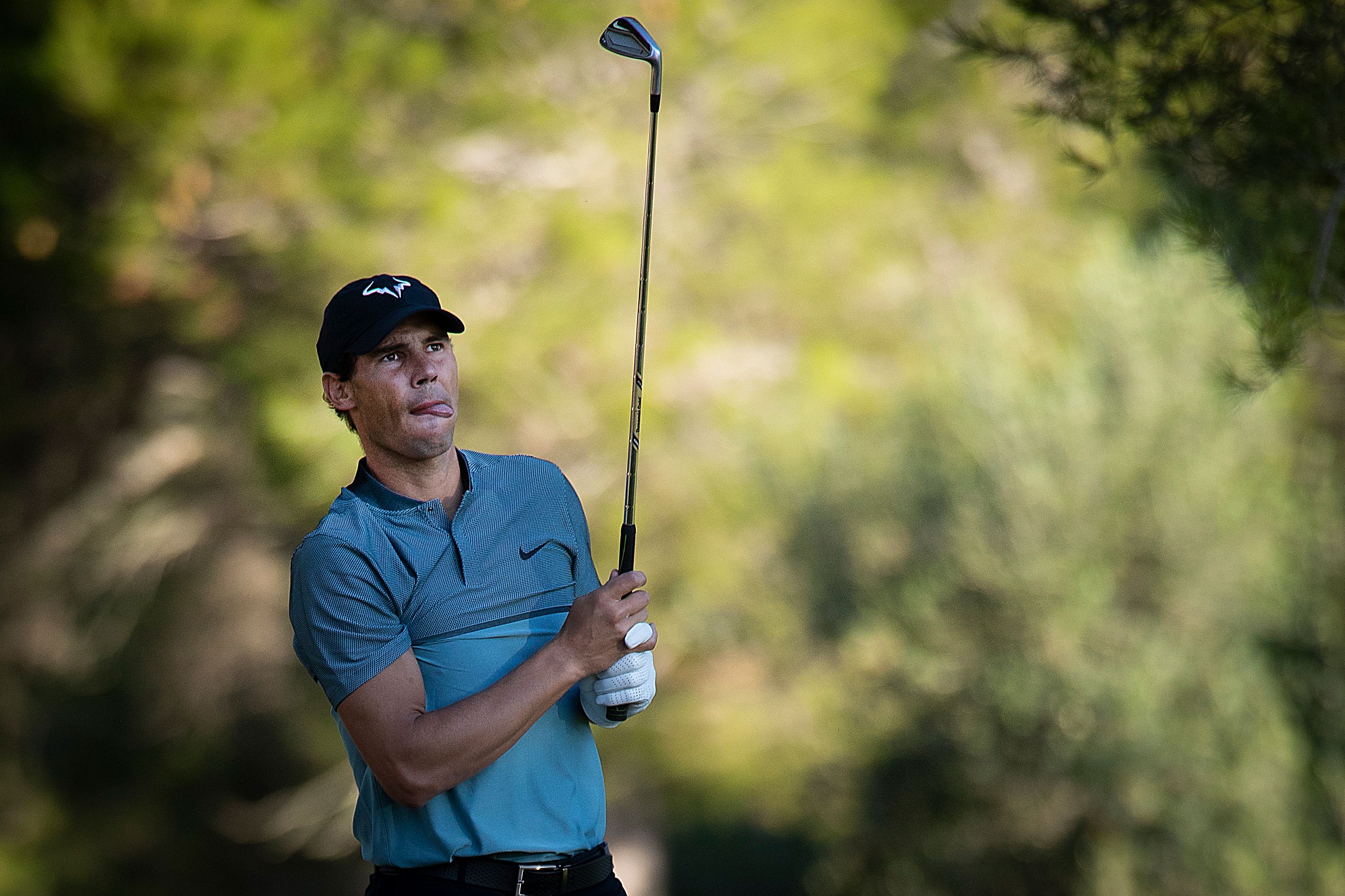 Rafael Nadal saat tampil di turnamen golf Balearic Golf Pro-Am Championship.