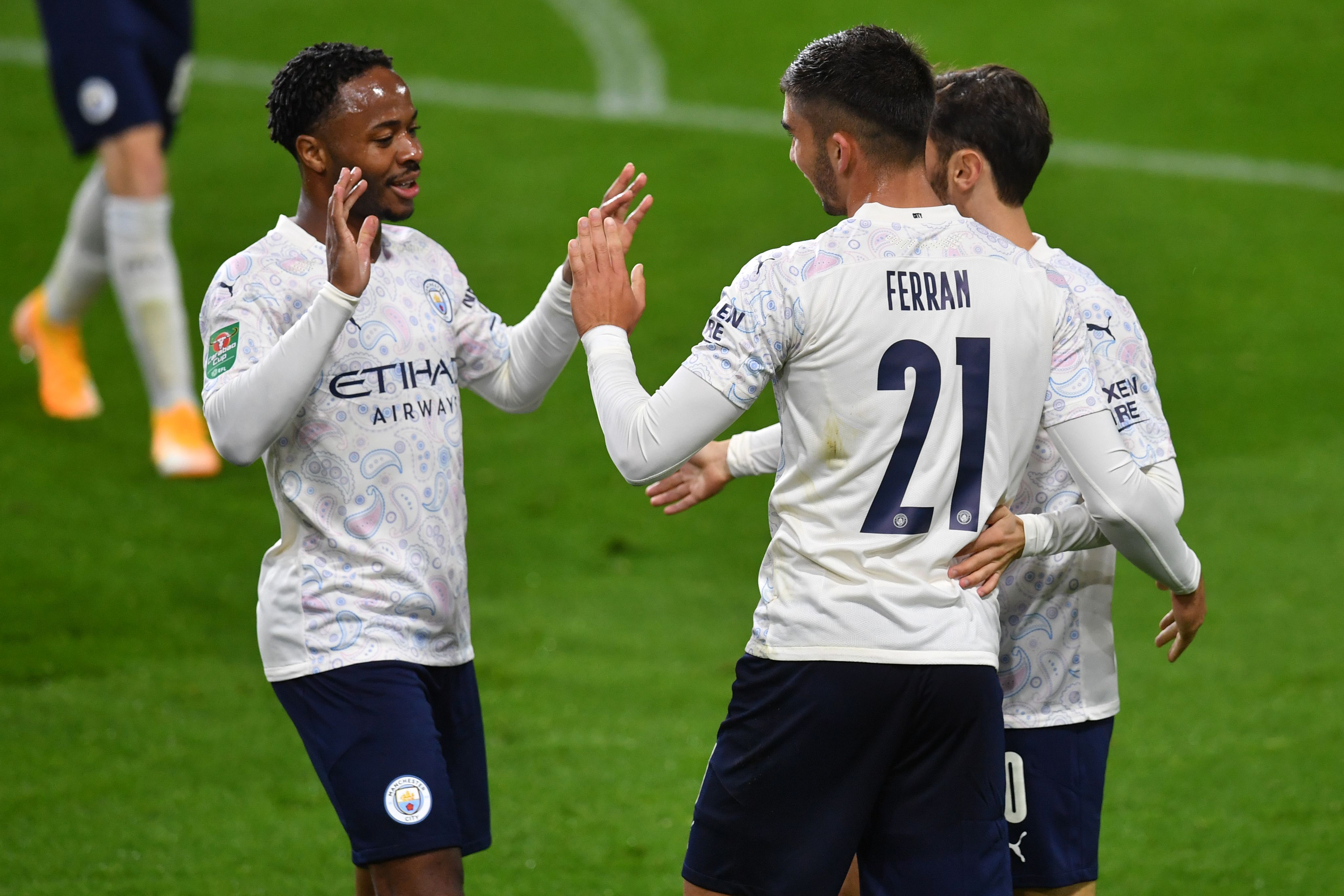 Pemain Manchester City melakukan selebrasi usai mencetak gol ke gawang Burnley di laga Piala Liga.