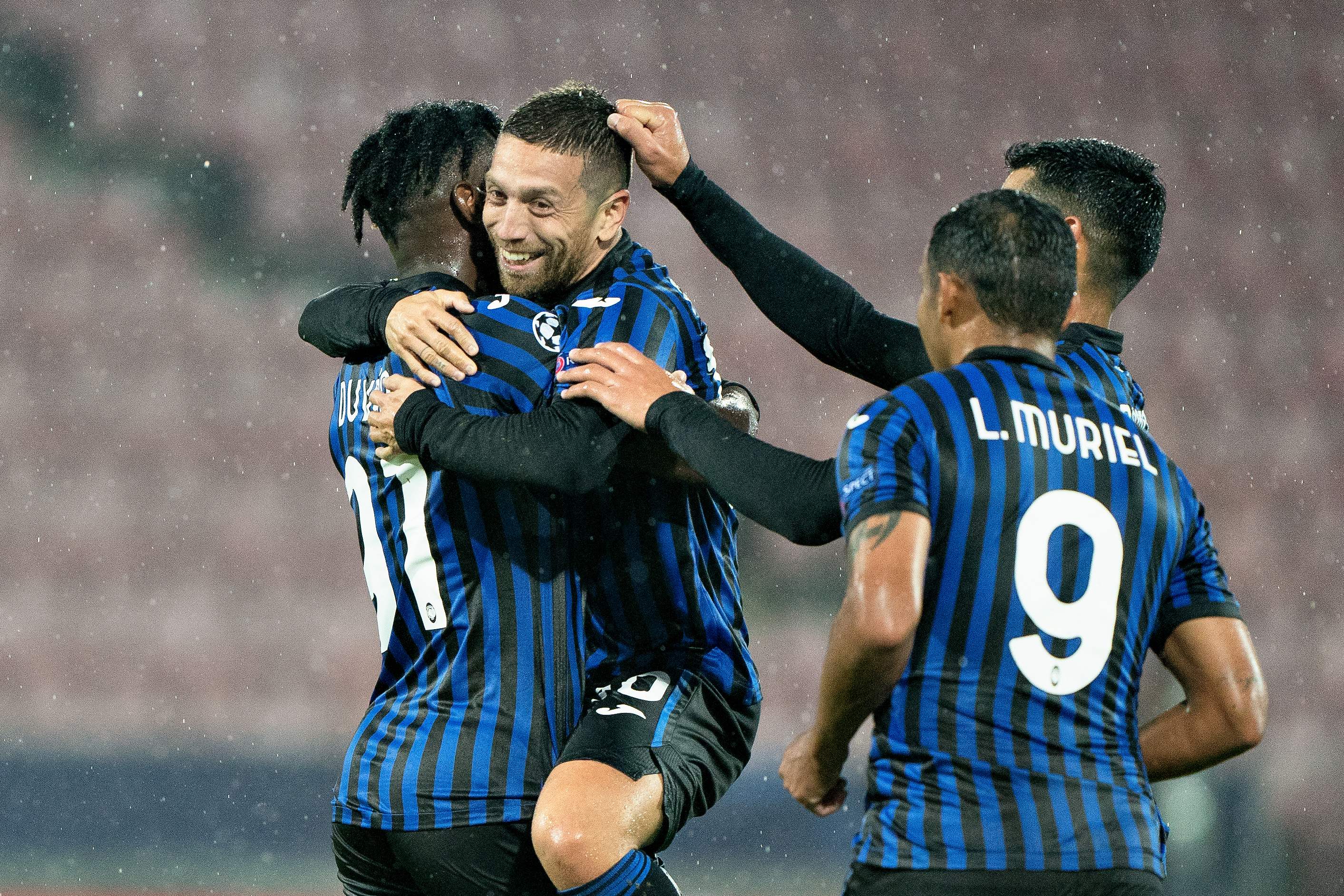 Pemain Atalanta melakukan selebrasi usai mencetak gol ke gawang Midtjylland di laga Liga Champions.