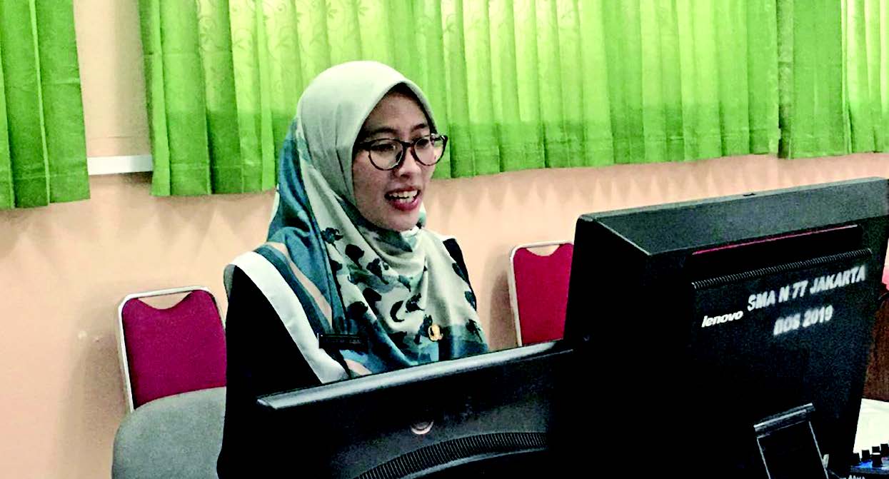 Fajar Selawati Guru PPKN SMAN 77 Jakarta