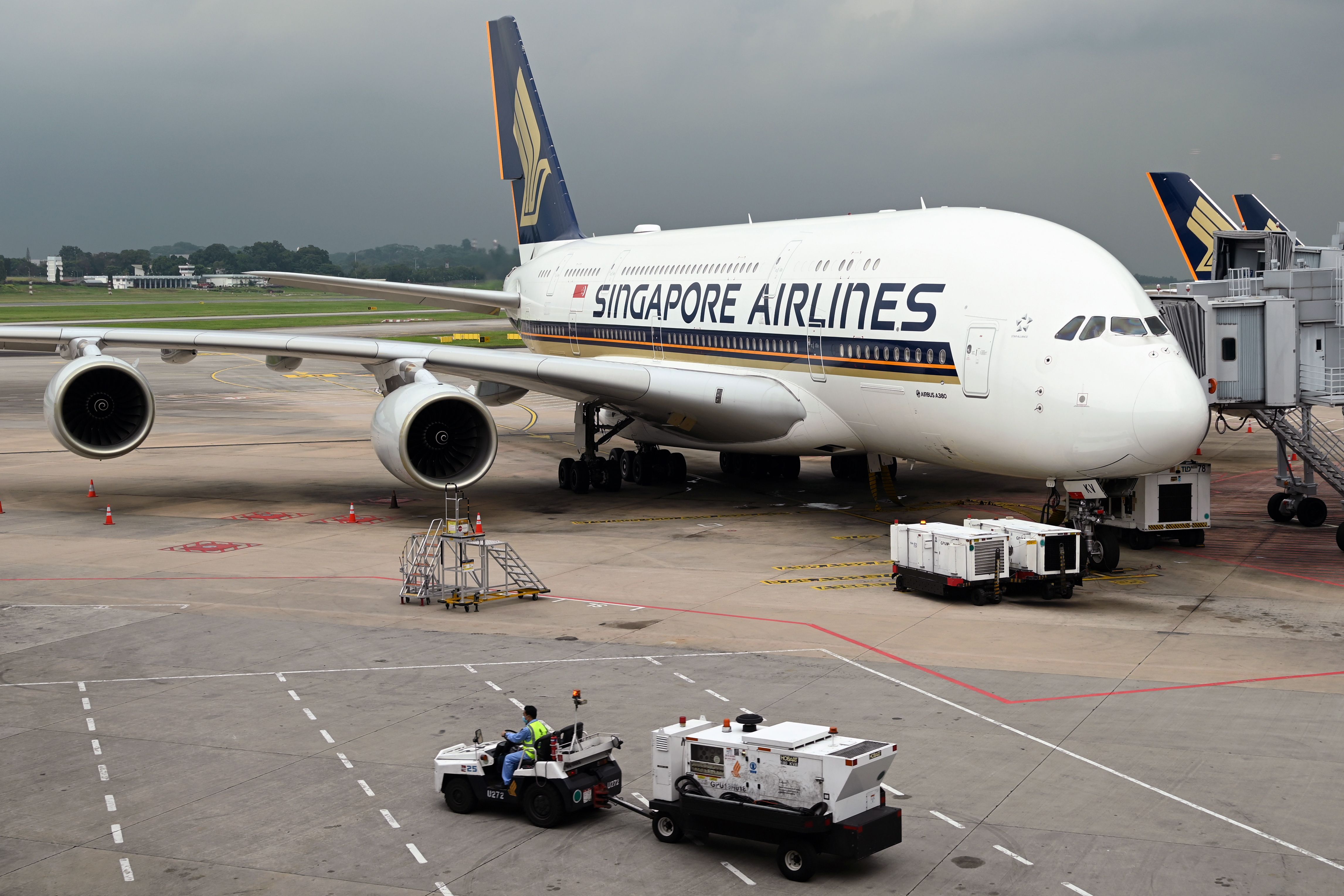 Pesawat milik Singapore Airlines diparkir di Bandara Changi, Singapura.