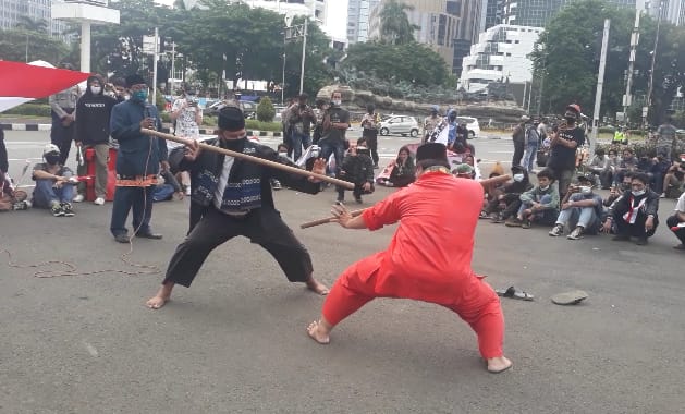 Aksi damai dukungan terhadap TNI dan Polri yang dilakukan Aliansi Muda Peduli Nusantara (AMPN).