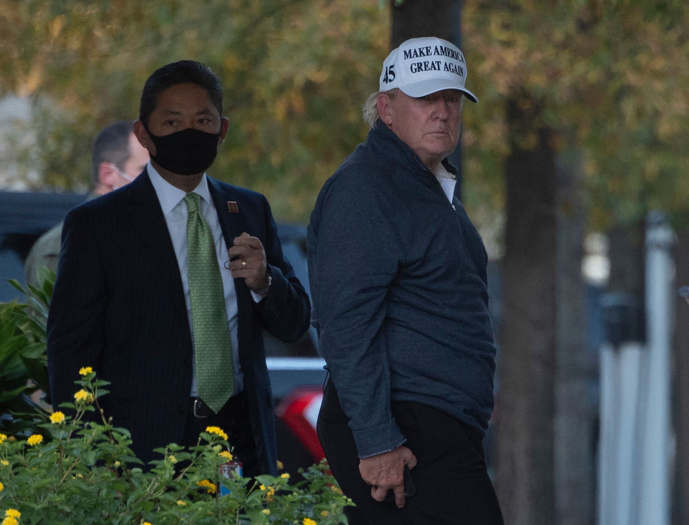 Presiden Donald Trump kembali ke Gedung Putih dari bermain golf, di Washington DC (7/11).