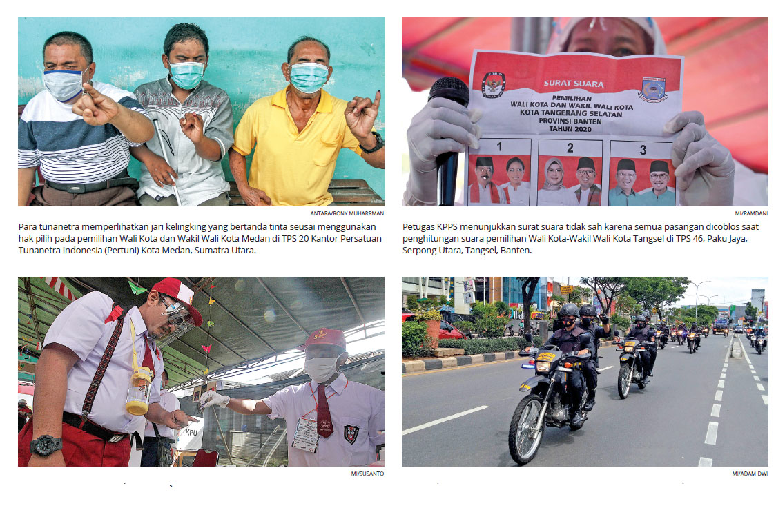 Petugas KPPS yang memakai seragam sekolah dasar meneteskan tinta ke jari rekannya seusai mencoblos di TPS 49 Cendana Residence, tsmhdr;