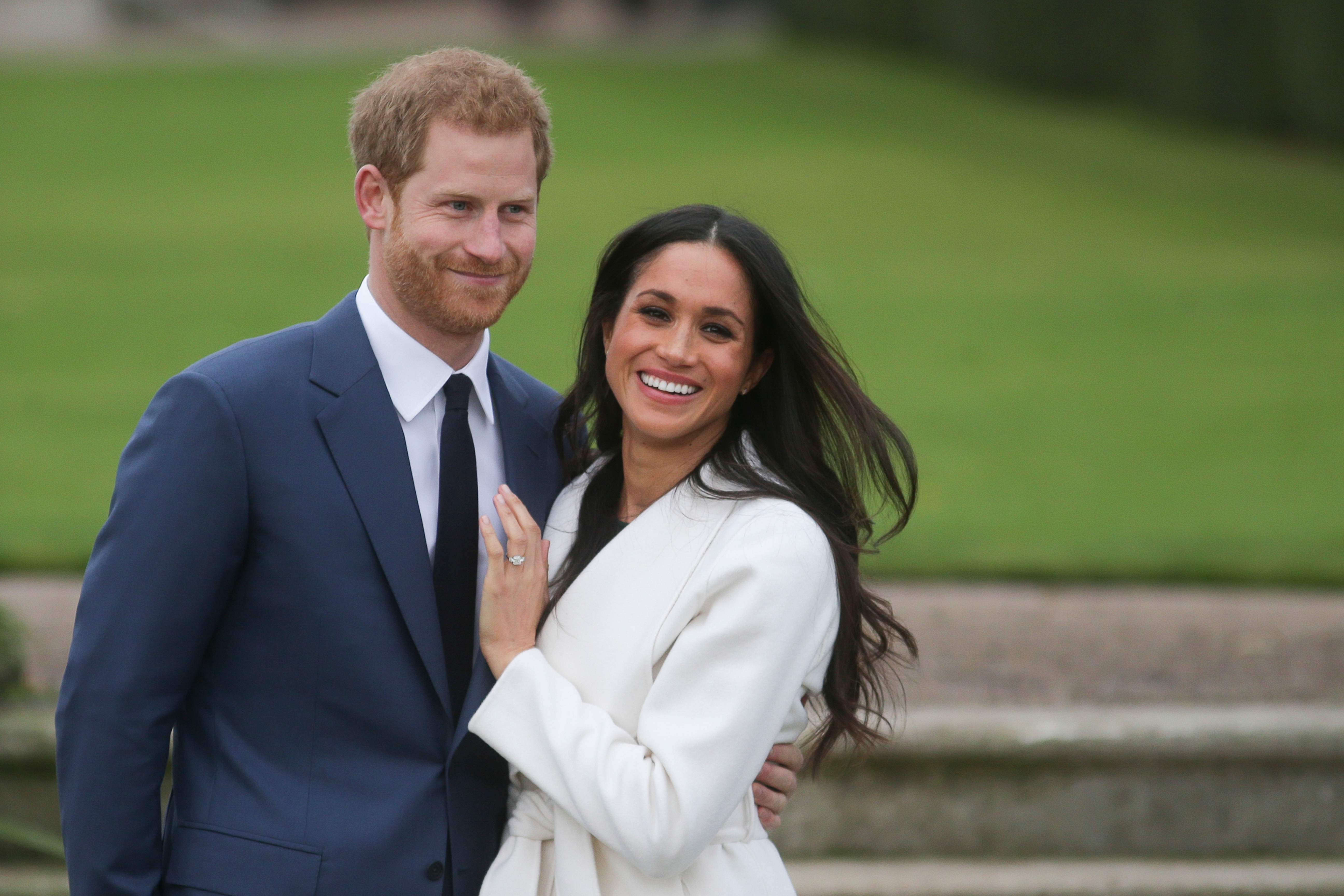 Pangeran Harry dan istrinya Meghan Markle