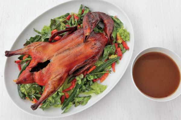 Honey Roasted Duck with Orange Sauce.