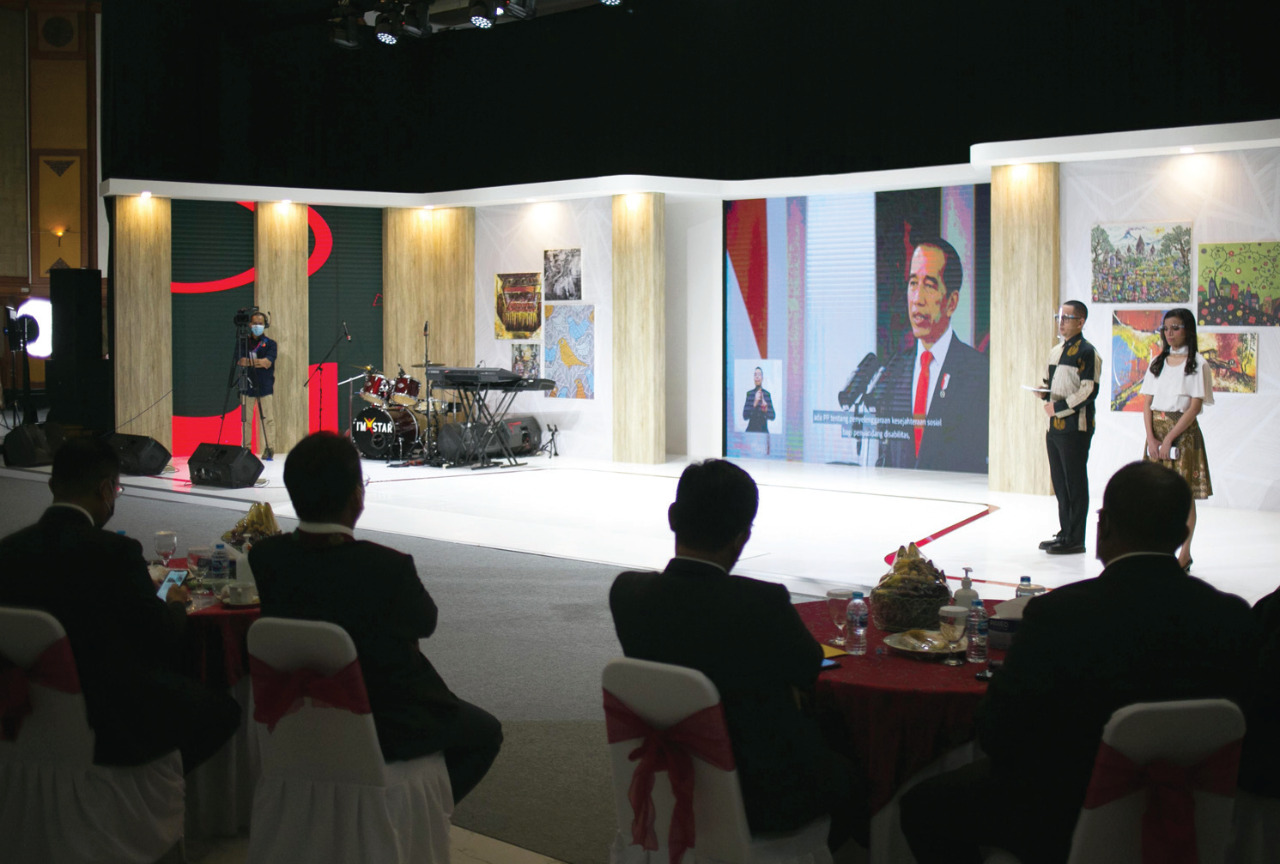 Presiden RI, Joko Widodo sedang memberikan Pidato secara virtual dalam Acara Puncak Hari Disabilitas Internasional 2020.