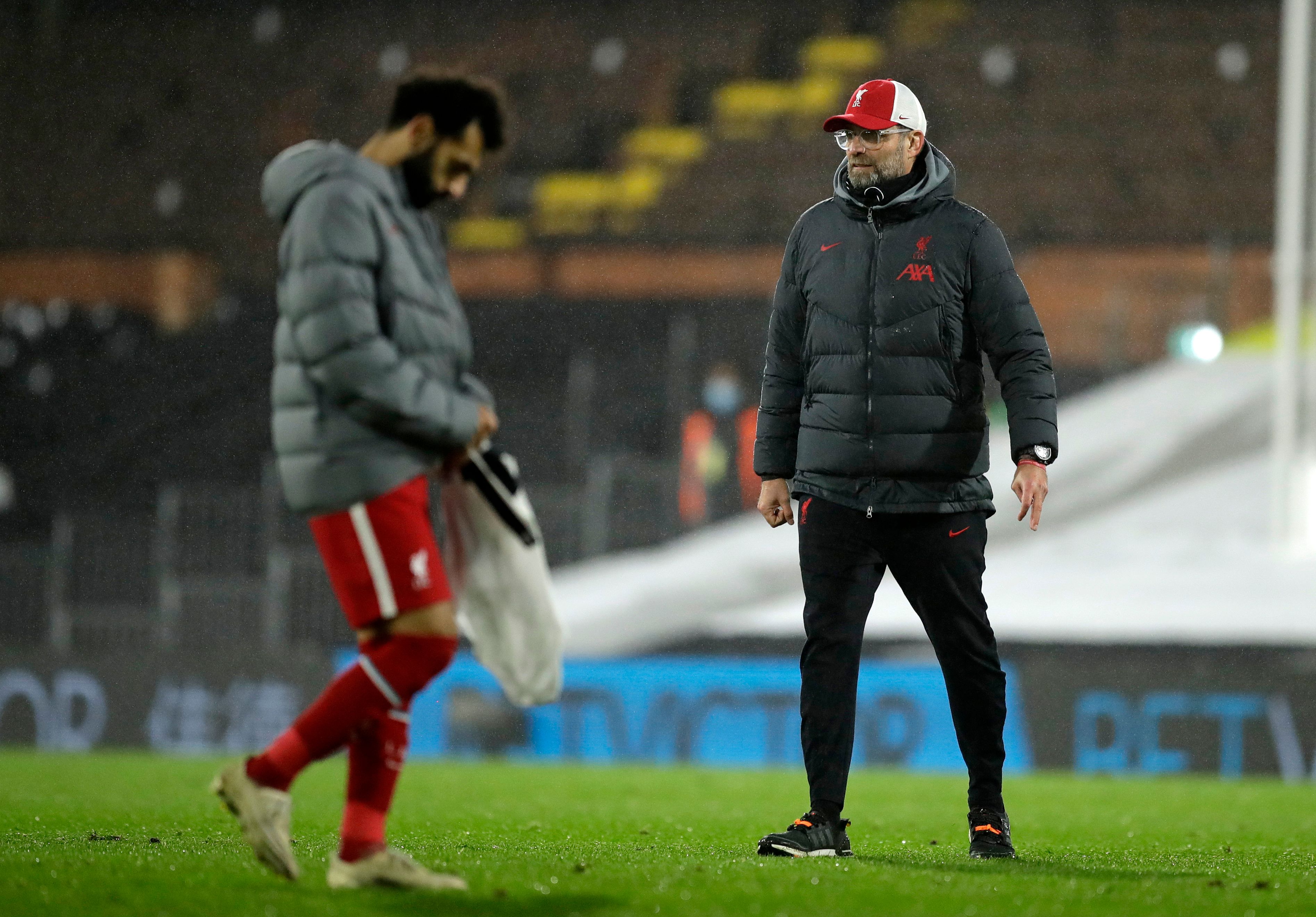 Mohamed Salah (kiri) dan Jurgen Klopp