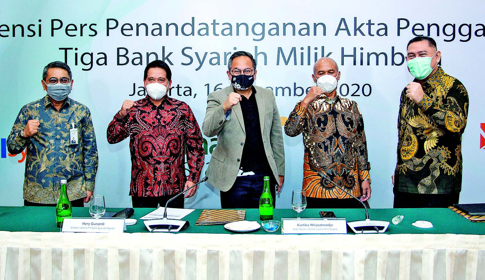 AKTA PENGGABUNGAN TIGA BANK SYARIAH