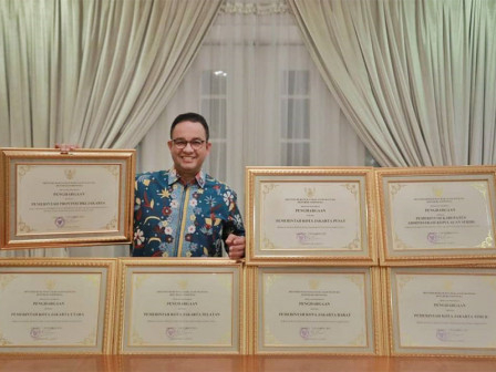   Gubernur DKI Jakarta Anies Baswedan dan sejumlah penghargaan yang dicapai Pemprov DKI Jakarta selama tahun 2020. 