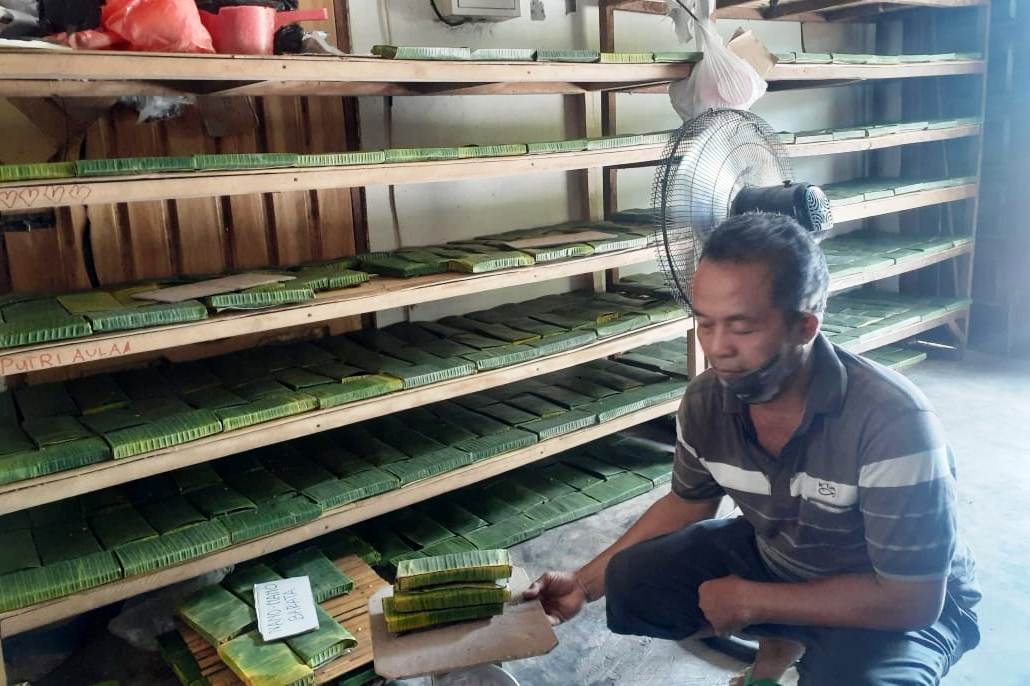 Ilustrasi perajin tempe.