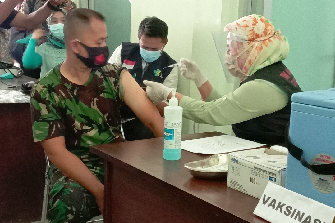 Ilustrasi vaksinasi covid.