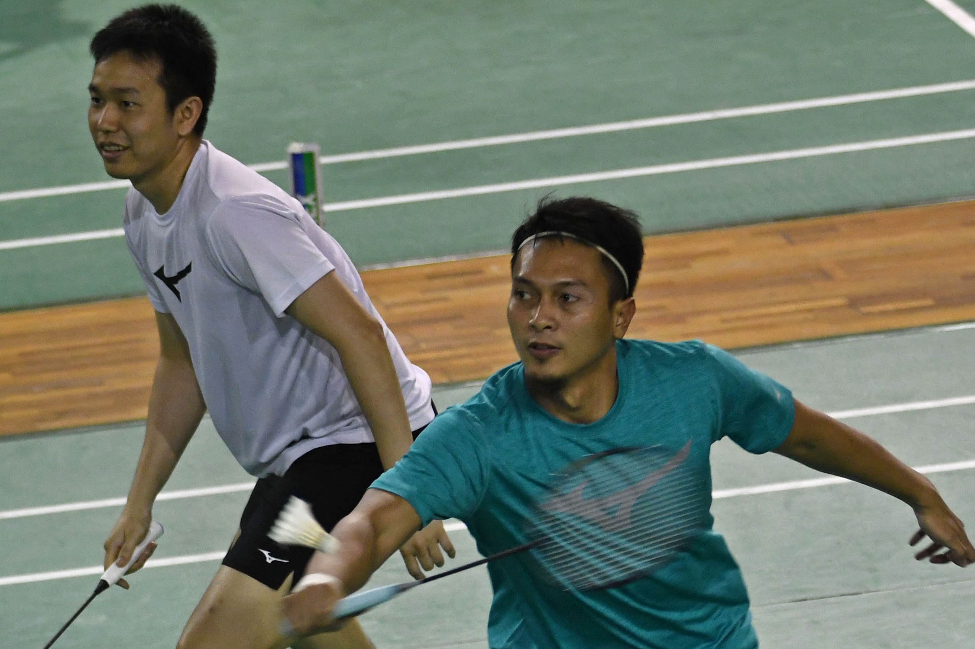 Pebulu tangkis ganda putra Hendra Setiawan (kiri) dan Mohammad Ahsan.