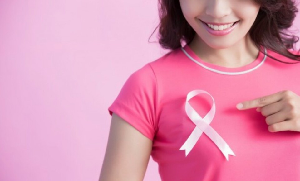 Ilustrasi pita pink simbol kanker payudara