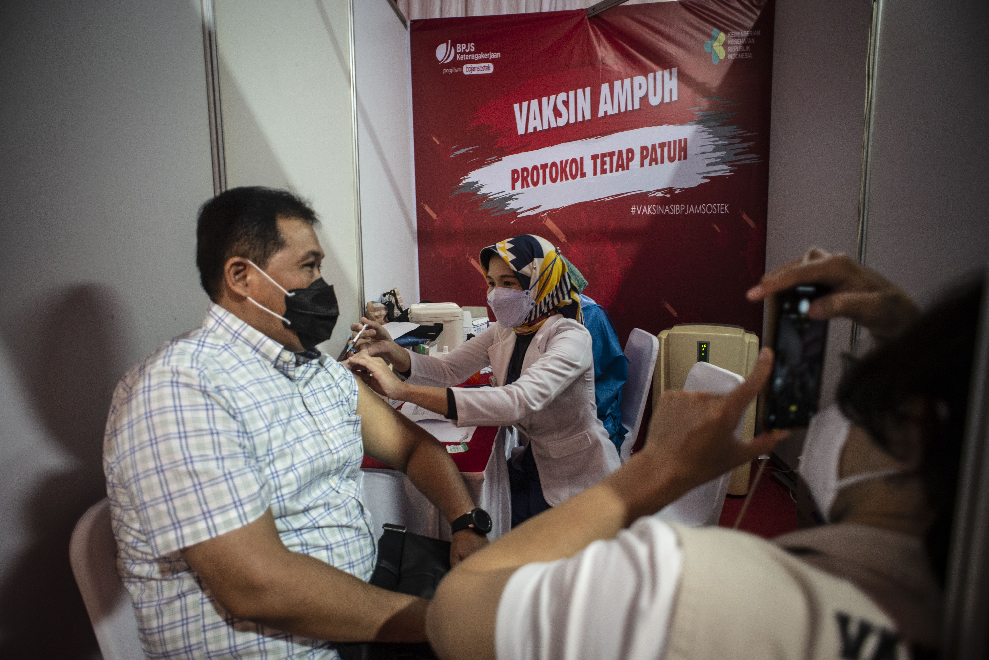 Ilustrasi vaksinasi covid-19
