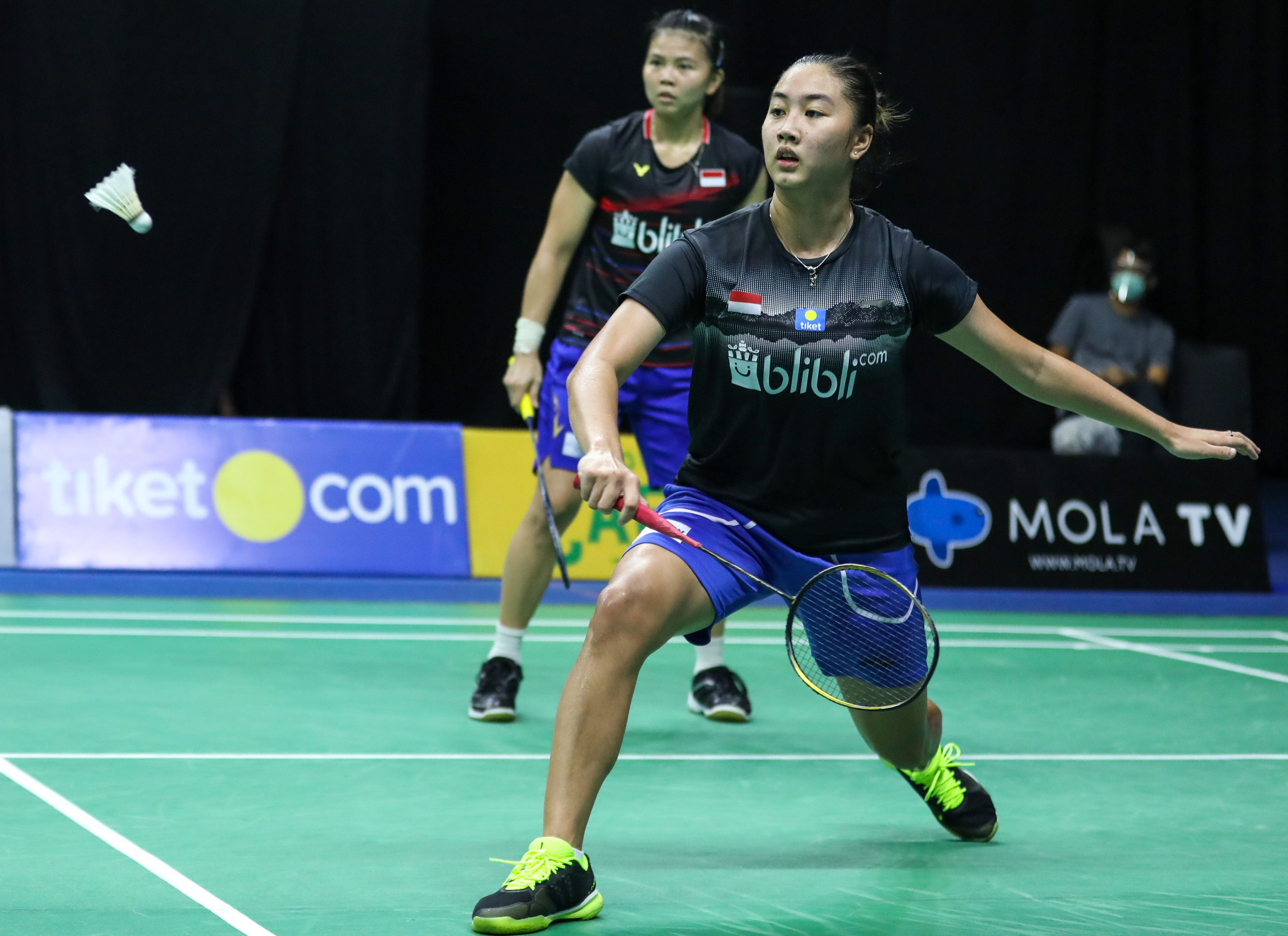 Ilustrasi pertandingan bulu tangkis