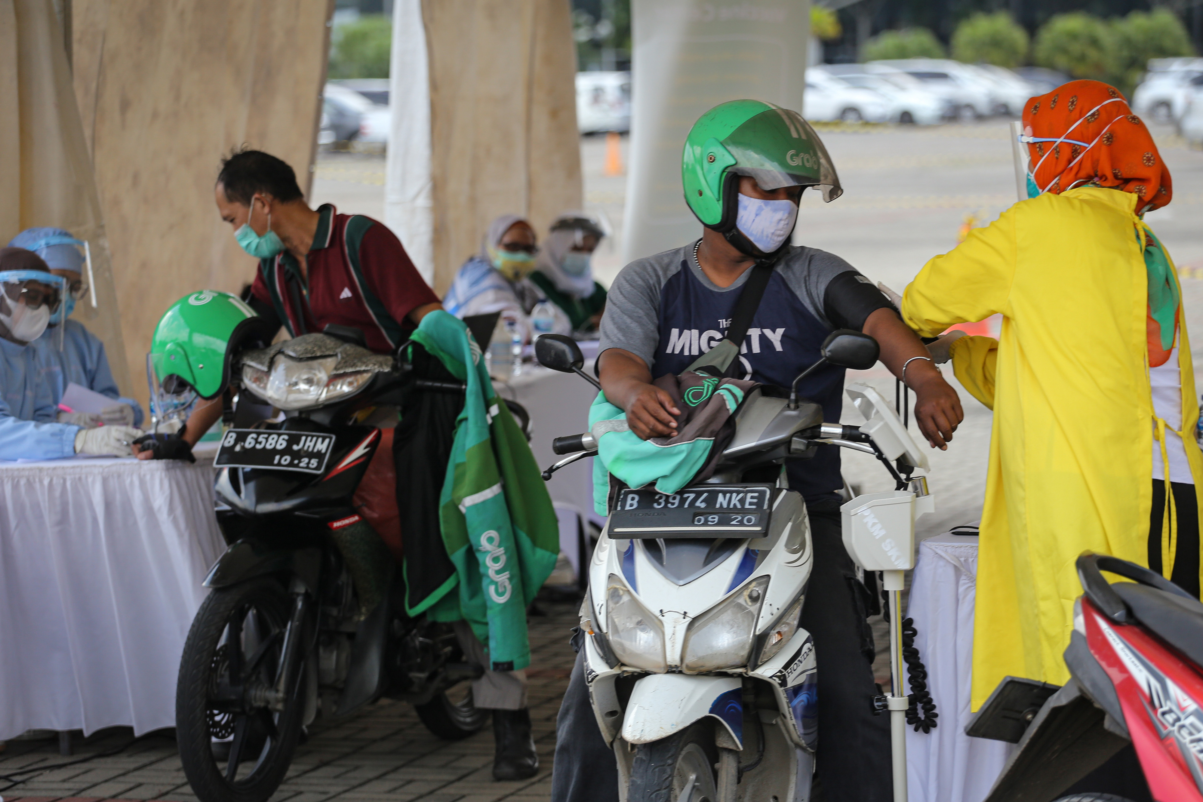 Pengemudi Ojek Daring Sebut Vaksin Modal Penting dalam Bekerja